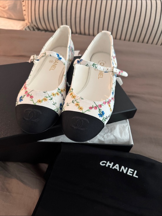 CHANEL Shoes - CHANEL White Floral Mary Jane Flats with Black Cap Toe